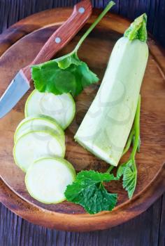 fresh marrow on the wooden background