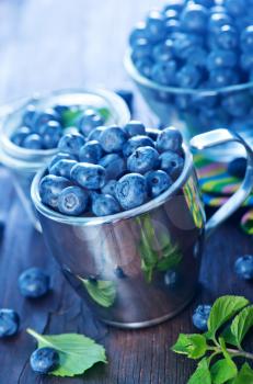 fresh blueberry on a table, blueberry on wooden background