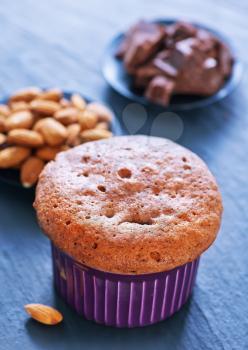 muffins with chocolate and almond on a table