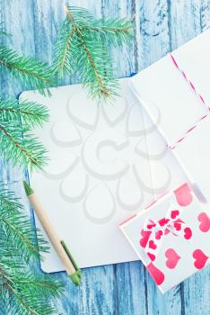 notebook and christmas decoration, notebook on a table