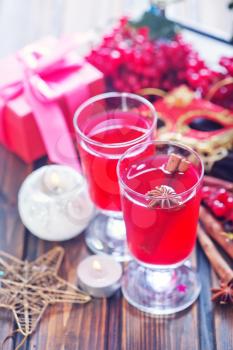 christmas drink with berries and on a table