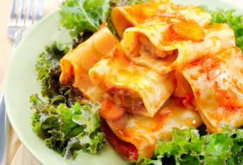 pasta with sauce and salad