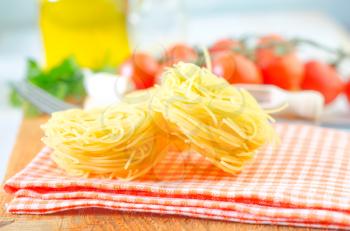 raw pasta and tomato