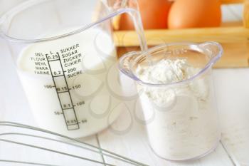 ingredients for dough, eggs, flour and milk