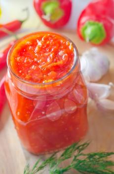 Fresh chilli sauce in the glass bank