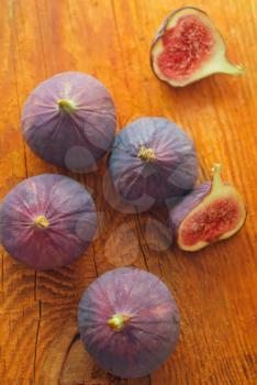 The fig on the wooden board, fresh fig