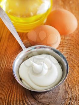 Homemade egg-free mayonnaise in the metal bowl