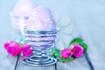 easter eggs and flowers on a table