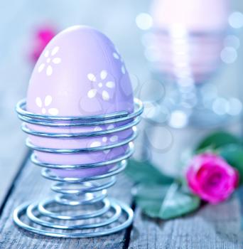 easter eggs and flowers on a table