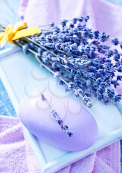 violet soap and lavender on the wooden table