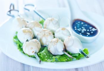 boiled eggs with white sesame and sauce