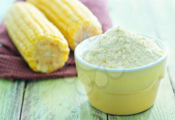 corn flour in bowl and on a table