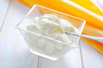 sour cream in glass bowl