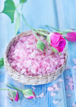 pink sea salt in bowl and on a table