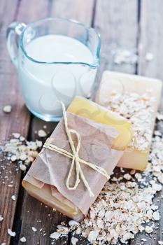 soaps on a table, Oatmeal soap and milk in jug