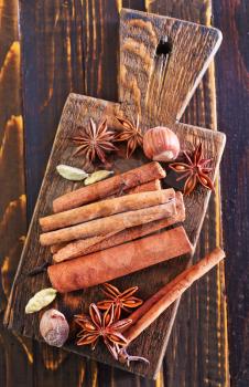 aroma spices, cinnamon an anise on wooden table