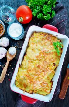 potato gratin with cheese on a table