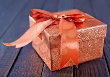 box for present on the wooden table