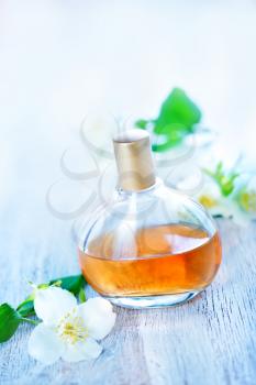 perfume in bottle and on a table