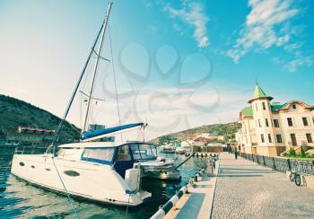 Boats and yachts in old port in Crimea