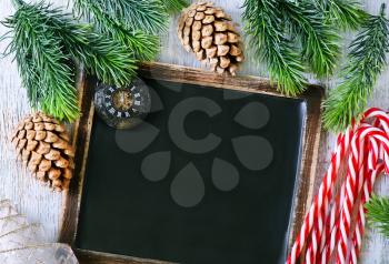 black board and candy canes on a table