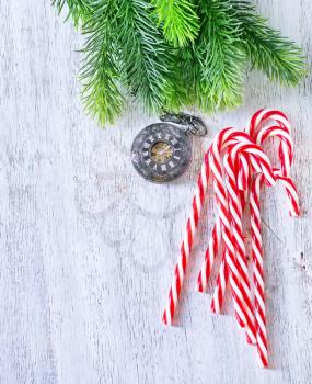 candy canes on the white table, christmas background