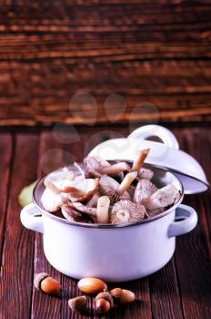 mushrooms in bowl and on a table