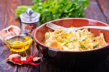 cauliflower baked with egg in the bowl