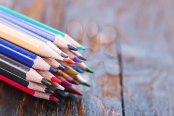 color pencils on a table, school supplies