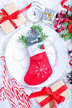 christmas background and white plate on a table