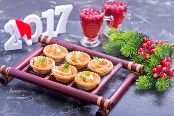 canape with red salmon on the bamboo tray