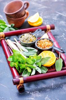 herbal tea with fresh mint on the bamboo tray