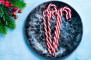 candycanes on plate and on a table
