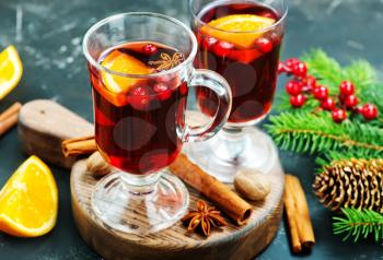 christmas drink with fruits and aroma spice