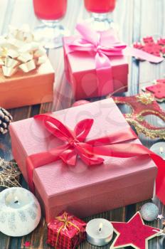 boxes for present on the wooden table, xmas background