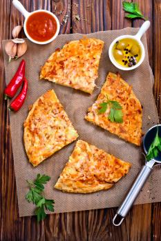 Fresh pizza with aroma spice and cheese