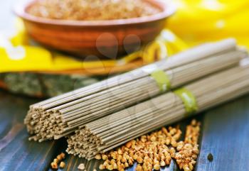 buckwheat noodles and buckwheat on a table
