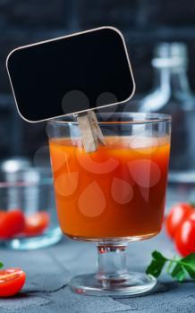 Cocktail Bloody-Mary in glass and on a table