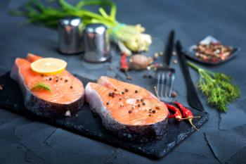 fresh salmon with spice on a table