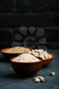 wheat bran in bowls and on a table