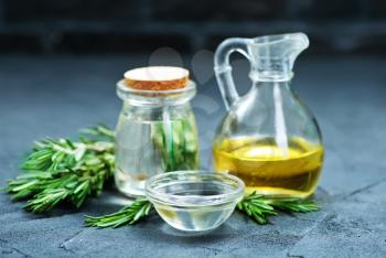 olive oil with rosemary, oil in bottle