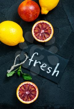 citrus background, fresh citrus fruit on a table