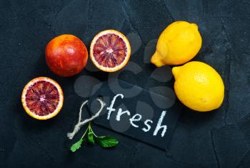 citrus background, fresh citrus fruit on a table