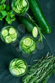 cucumber drink in glasses and on a table