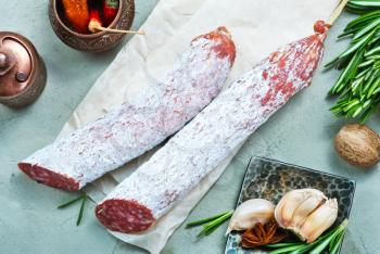 salami with aroma spice on a table