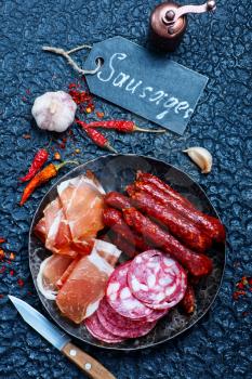 Italian ham, smoked sausages and salami, stock photo