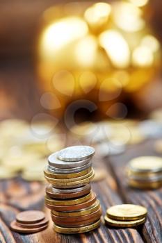 coins on a table, money on wooden table, stock photo