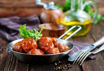meatballs with tomato sauce in the pan