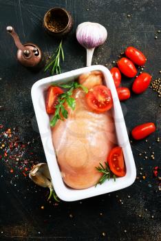 Raw chicken fillet meat in bowl for baked. Ready for cooking. Fresh Chicken breast Meat steak.