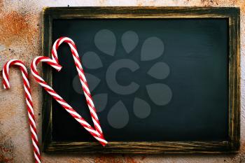 christmas background, candy cane on a table, copy space